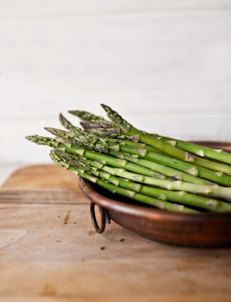 blood clearing foods such as bowl of green asparagus